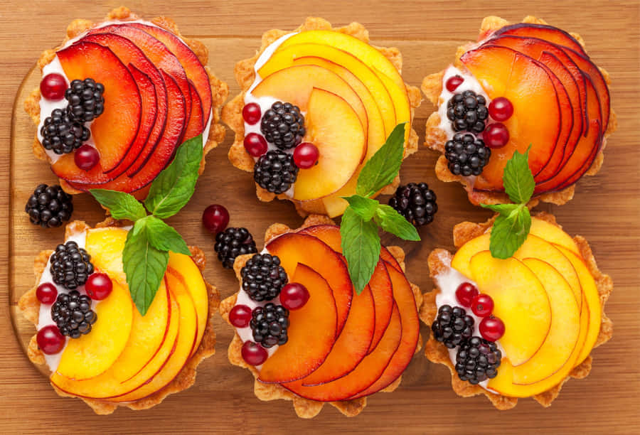 Colorful Spring Desserts On A Table Wallpaper