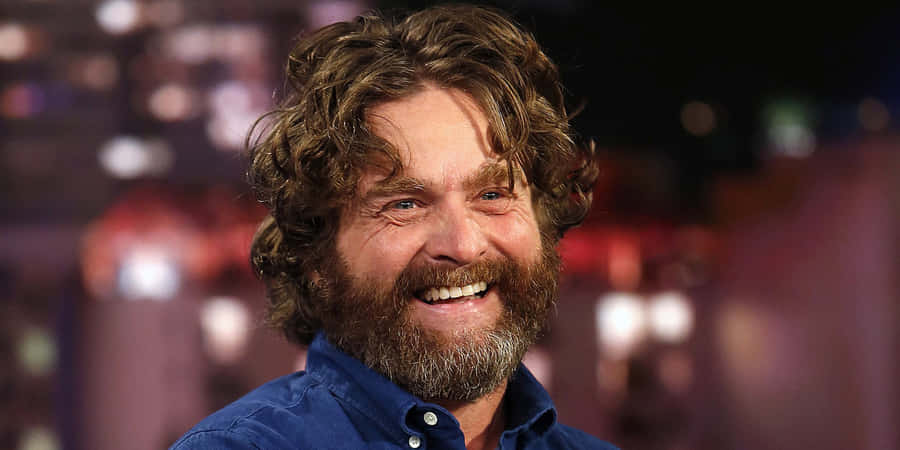 Comedian Zach Galifianakis Looking Off Into The Future Wallpaper