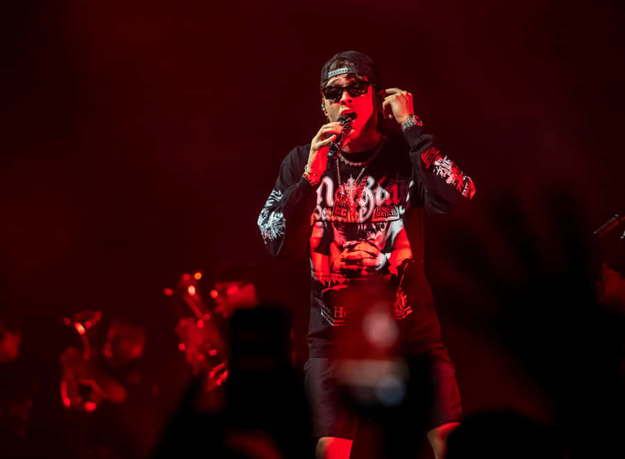 Concert Performance Singer Red Stage Lights Wallpaper