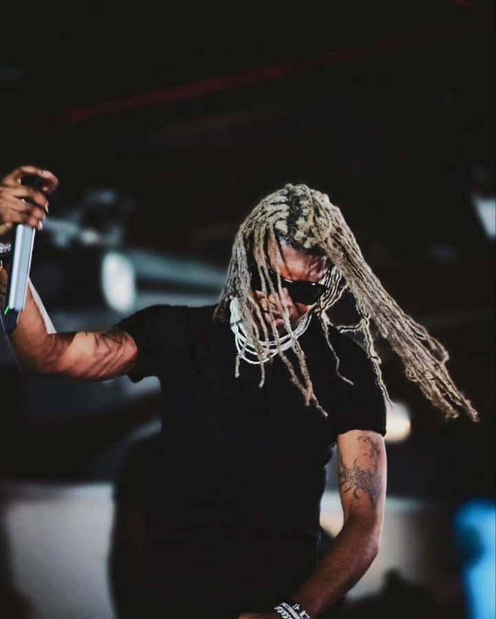 Concert Performancein Dark Lighting Wallpaper