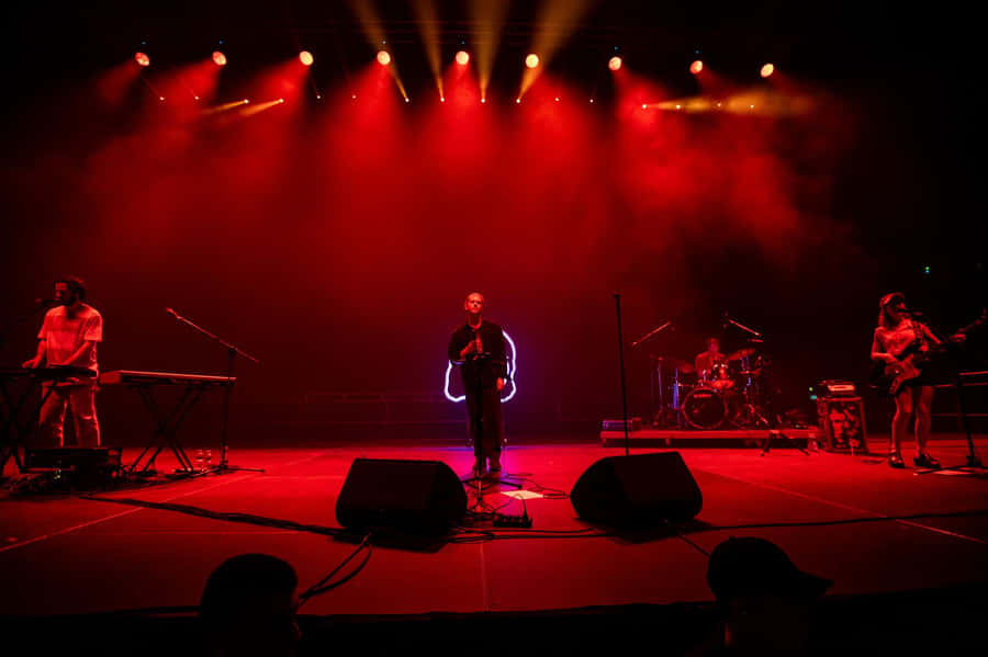 Concert Stage Performance Red Lights Wallpaper