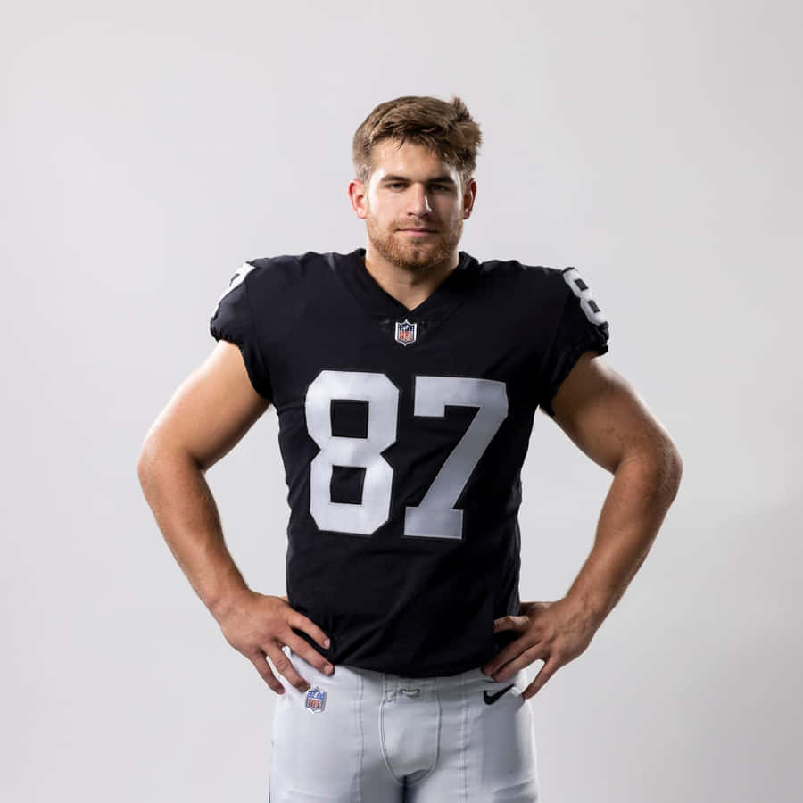 Confident Football Player Portrait87 Wallpaper
