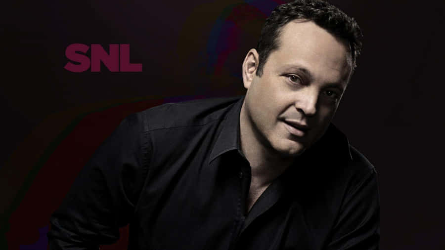 Confident Vince Vaughn Posing For A Photoshoot Wallpaper