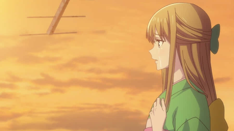 Contemplative Anime Characterat Sunset Wallpaper