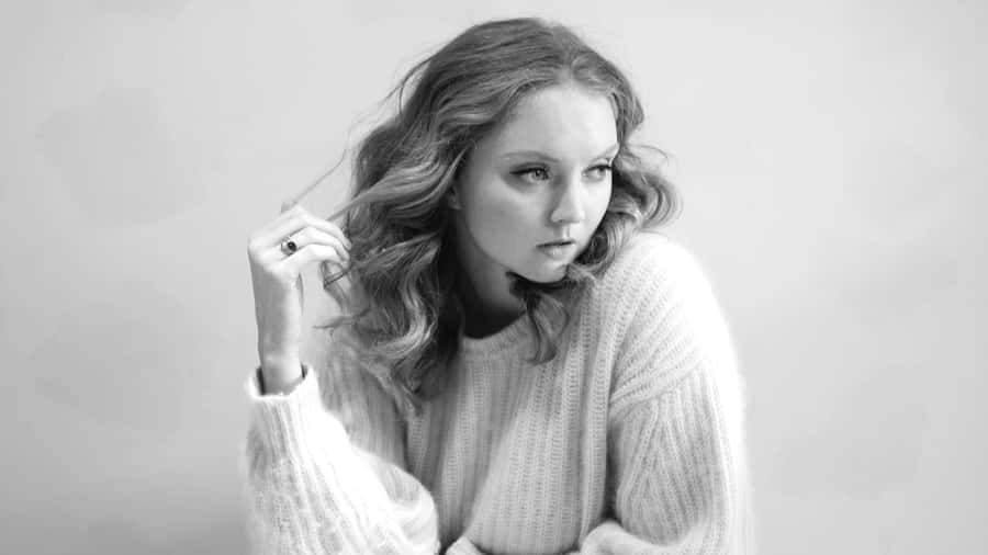 Contemplative Blackand White Portrait Wallpaper