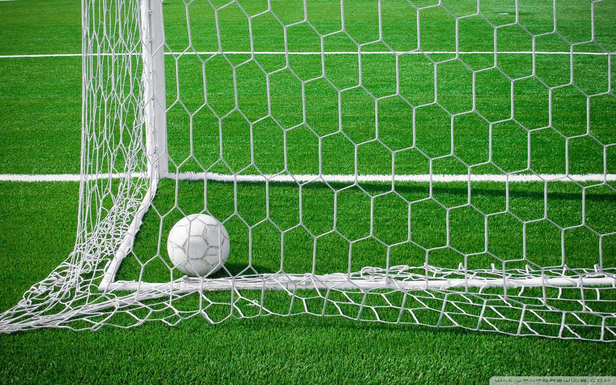 Cool Soccer Ball At Goal Wallpaper