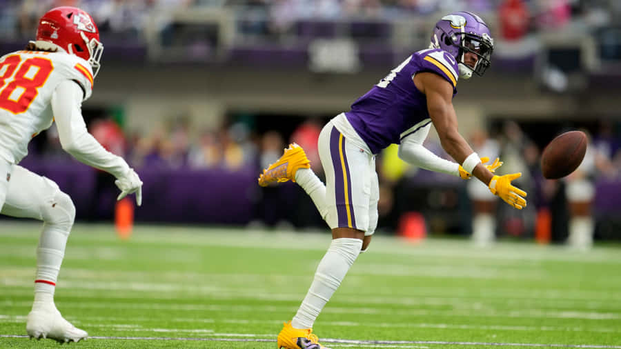 Cornerback In Action During Game.jpg Wallpaper