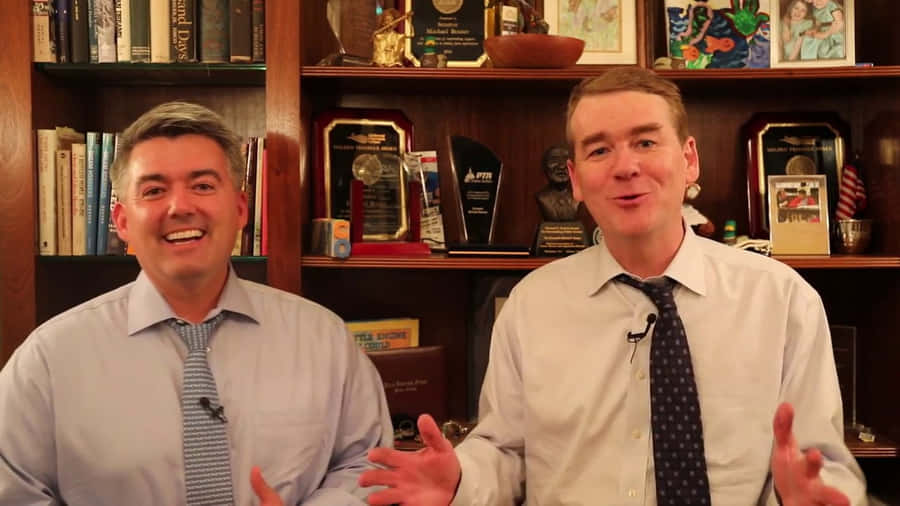 Cory Gardnerand Colleaguein Office Wallpaper