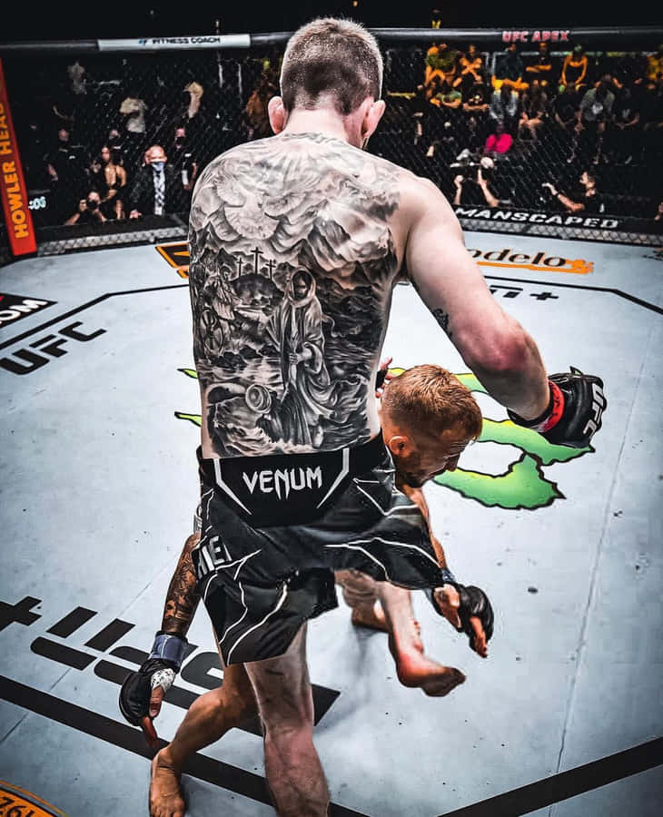 Cory Sandhagen Hitting Opponent With Knee Wallpaper