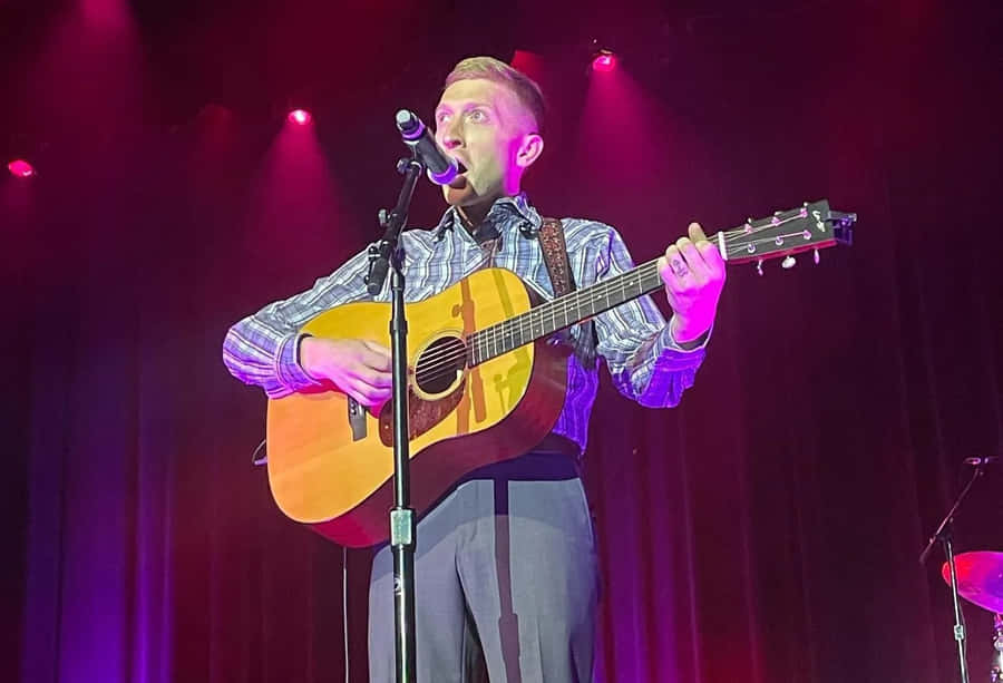 Country Music Performer On Stage.jpg Wallpaper