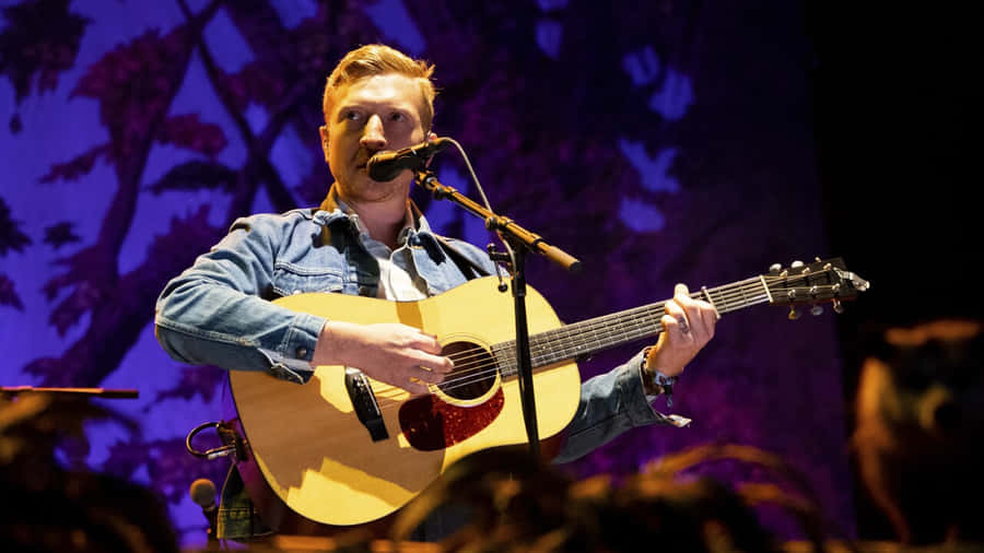 Country Musician Performing Live Wallpaper