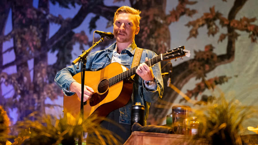 Country Musician Performing Live Wallpaper