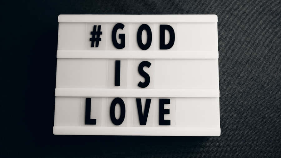 Couple In A Romantic Embrace At Sunset Wallpaper