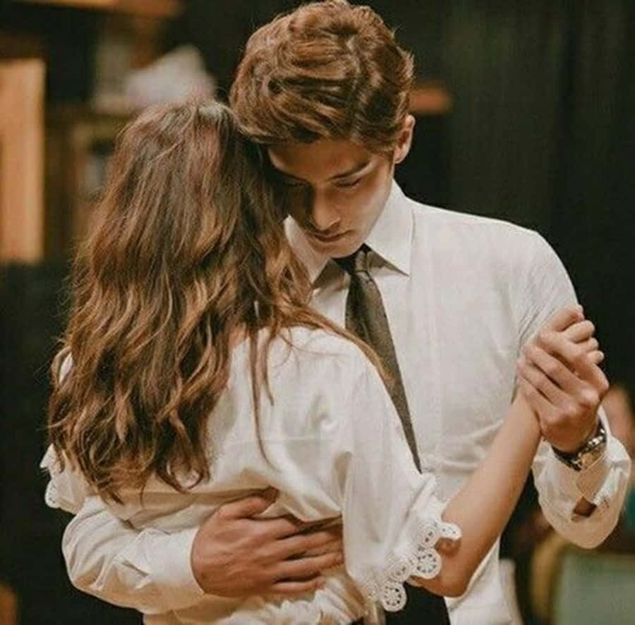 Couple Showing Sweet Affection To Each Other Wallpaper