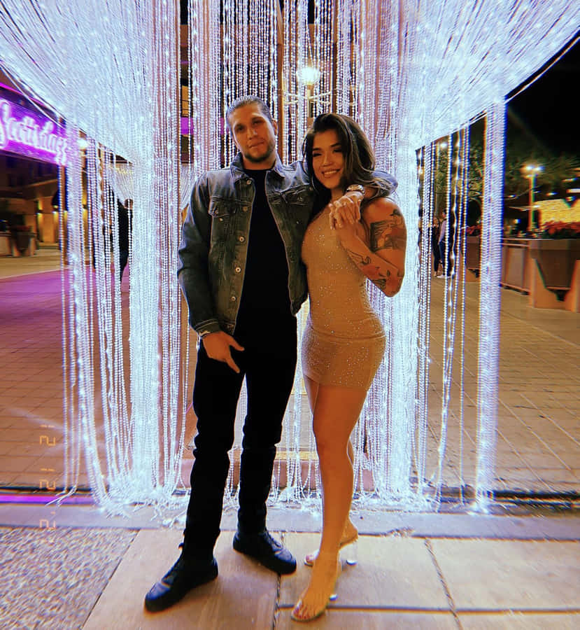 Couple Under Urban Lights Wallpaper