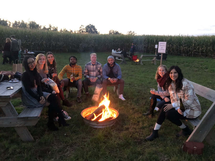 Cozy Fall Bonfire Scene Wallpaper