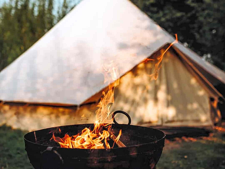 Cozy Fall Camping Scene Wallpaper