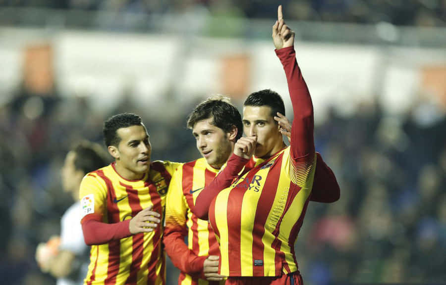 Cristian Tello Celebrating Goal With Teammates Wallpaper