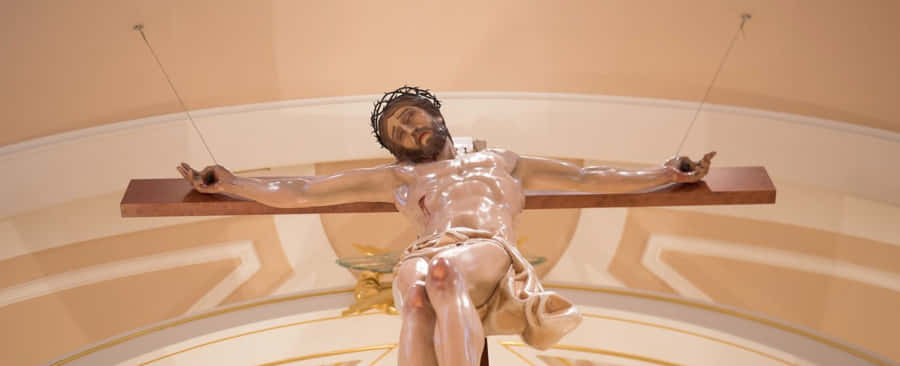 Crucifixion Statuein Church Wallpaper