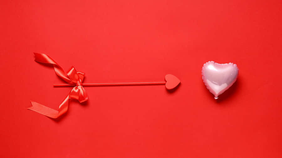 Cupid Arrow And Heart Balloon Wallpaper