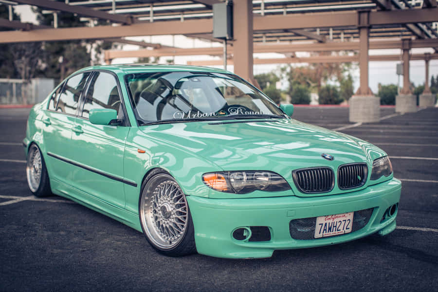 Custom Green B M W E46 Sedan Parked Wallpaper