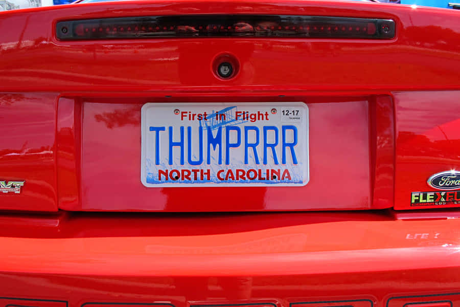 Customized Car License Plate On A Stylish Vehicle Wallpaper