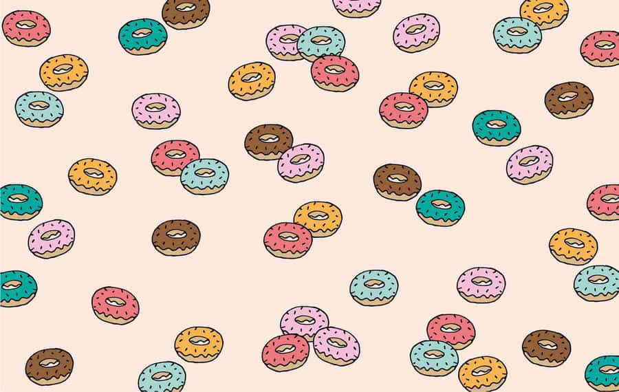 Cute And Colorful Donut Smiling With A Sprinkle Topping Wallpaper