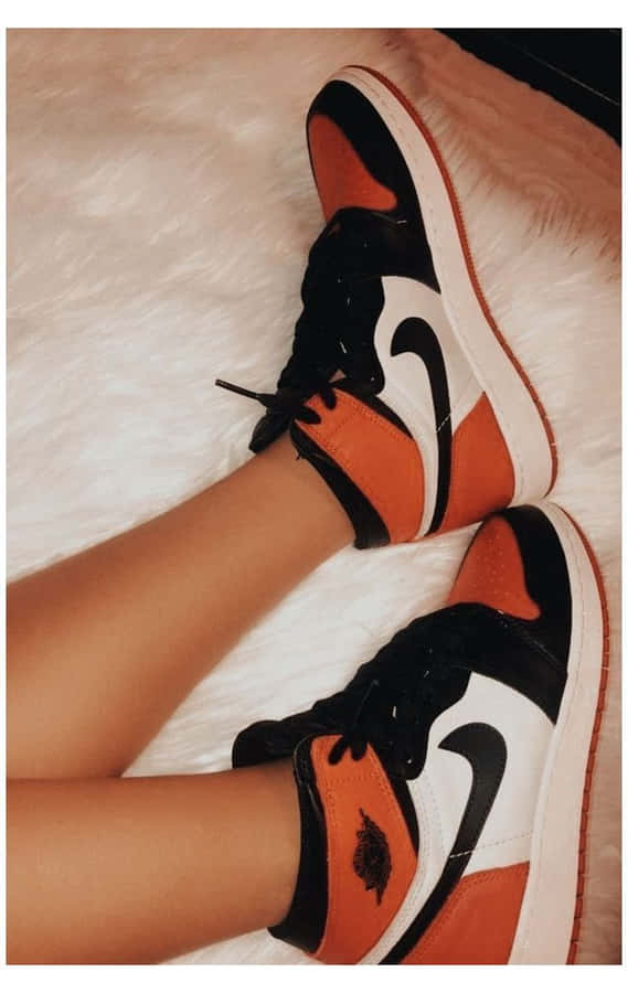 Cute And Stylish Shoes On A White Background Wallpaper