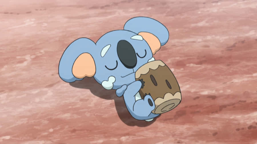 Cute Komala Lying On Ground Wallpaper