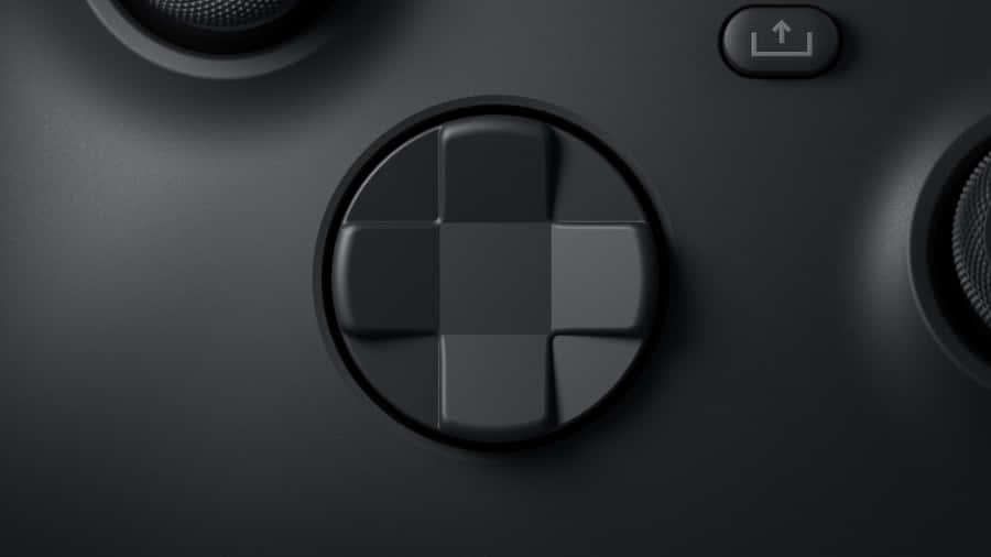 D-pad Of A Remote Game Controller Wallpaper