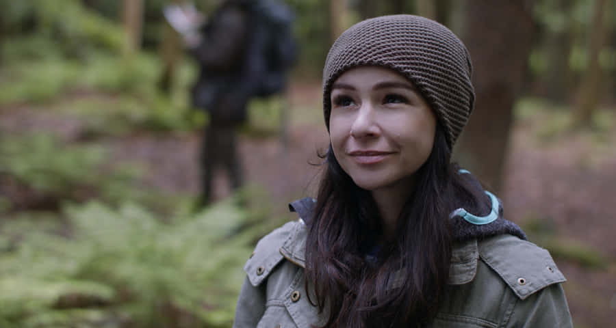 Danielle Harris Posing Elegantly In A Sunlit Photoshoot Wallpaper