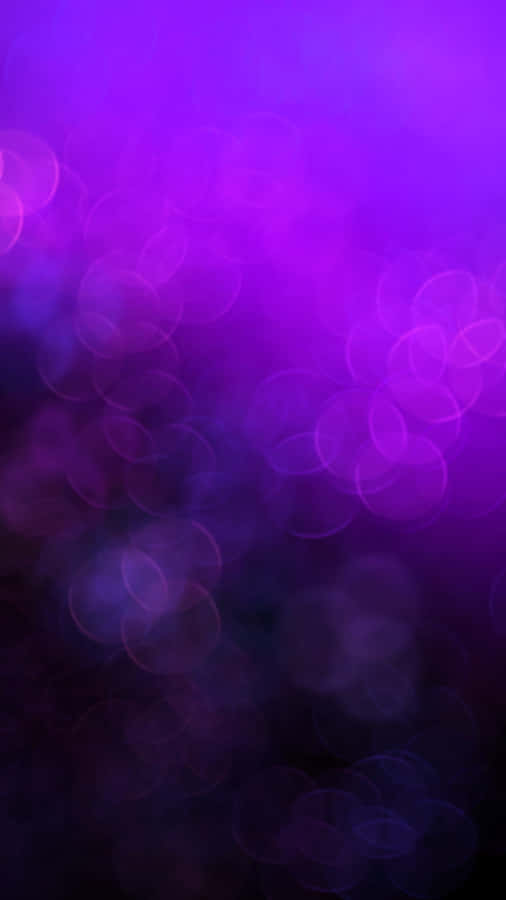 Dark Gradient With Shimmering Purple Shades Wallpaper