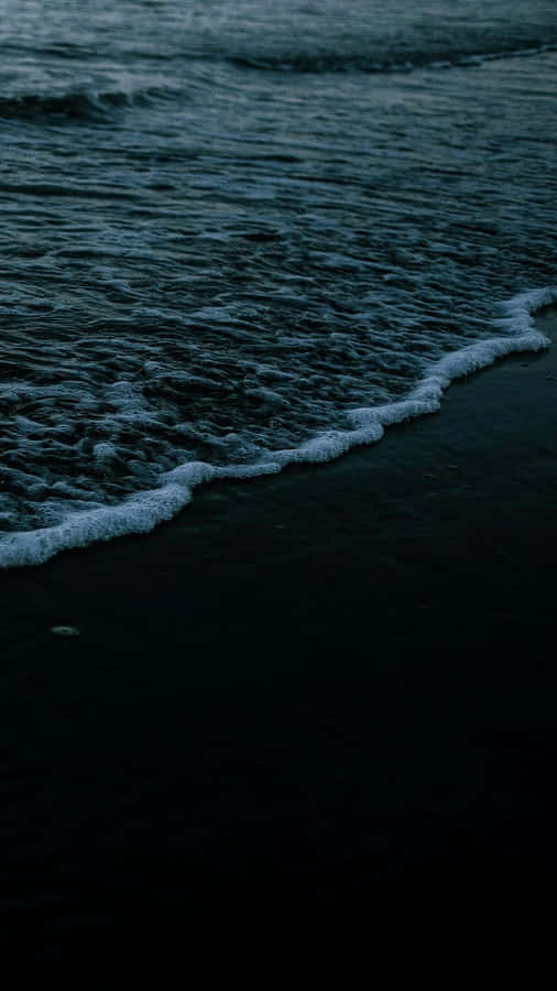 Dark Moody Beach Waves Nighttime Wallpaper