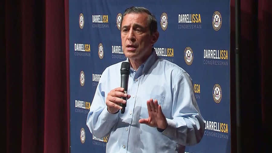 Darrell Issa Holding Microphone Wallpaper