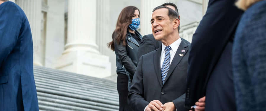 Darrell Issa Posing On The Steps Of The U.s Capitol Building Wallpaper