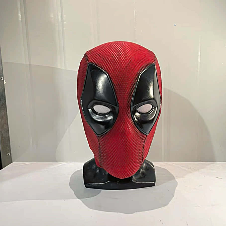 Deadpool's Iconic Red And Black Mask Wallpaper