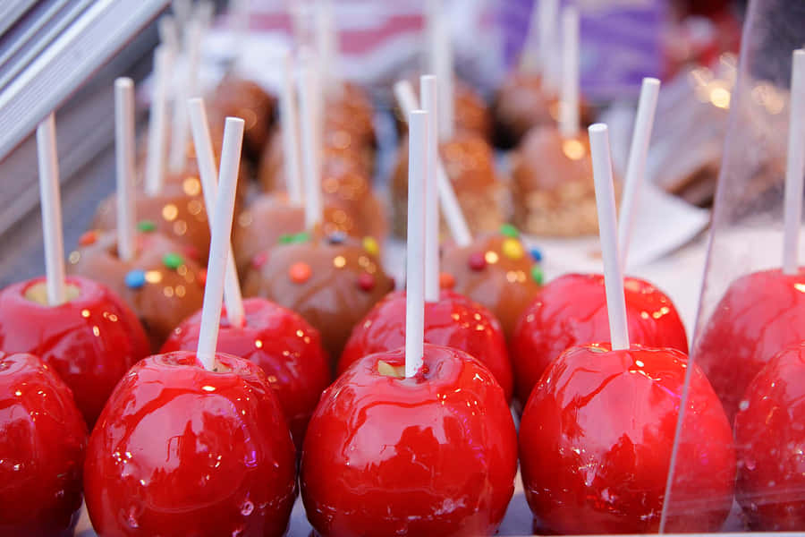 Delectable Candy Apples On Display Wallpaper