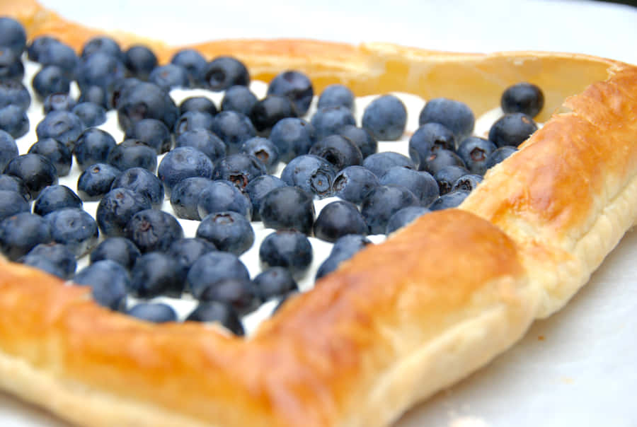 Delicious Blueberry Tart With Fresh Cream Wallpaper