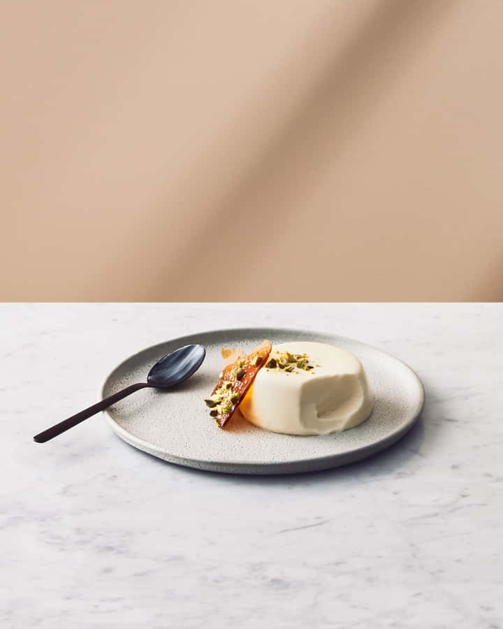 Delicious Minimalist Food Spread On A Wooden Surface Wallpaper