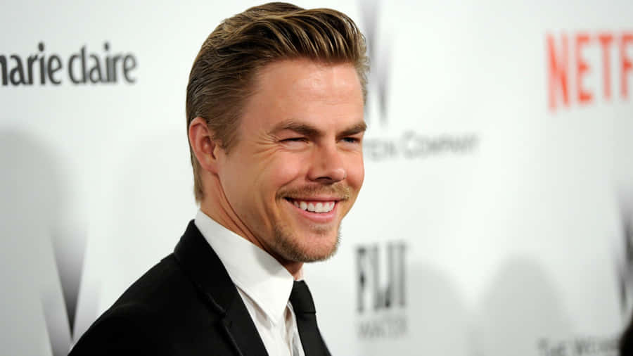 Derek Hough Smiling At Event Wallpaper