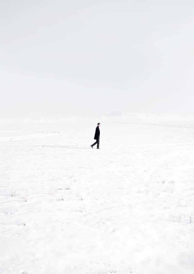 Desolate Snow Land Portrait Lonely Man Wallpaper
