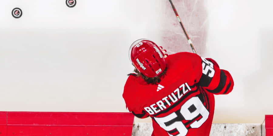 Detroit Red Wings Star Tyler Bertuzzi In Action Wallpaper