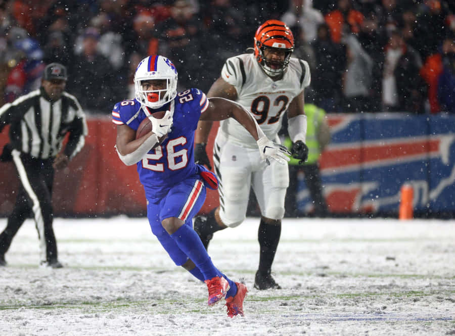 Devin Singletary Snowy Football Game Wallpaper