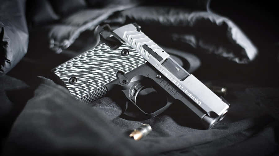 Diminutive Gun Wallpaper