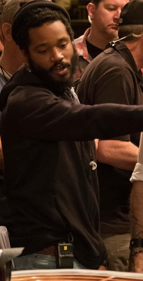 Director Ryan Coogler Posing For A Portrait Wallpaper