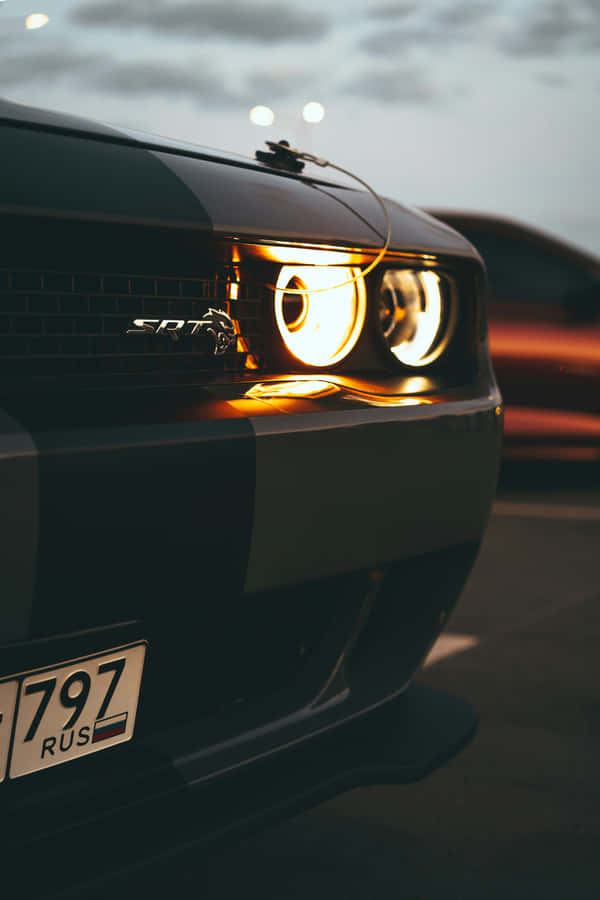Dodge Challenger S R T Headlightat Dusk Wallpaper