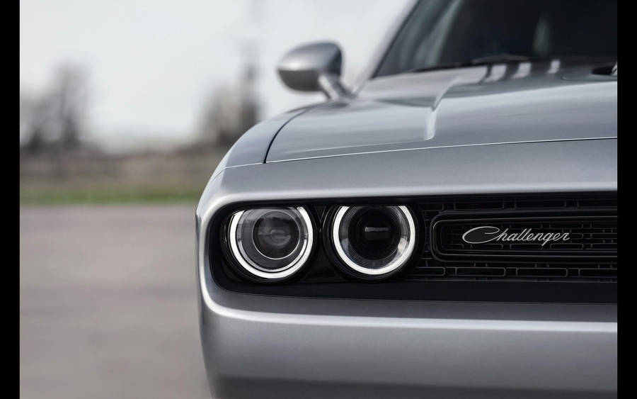 Dodge Challenger Wordmark Logo On A Vibrant Background. Wallpaper