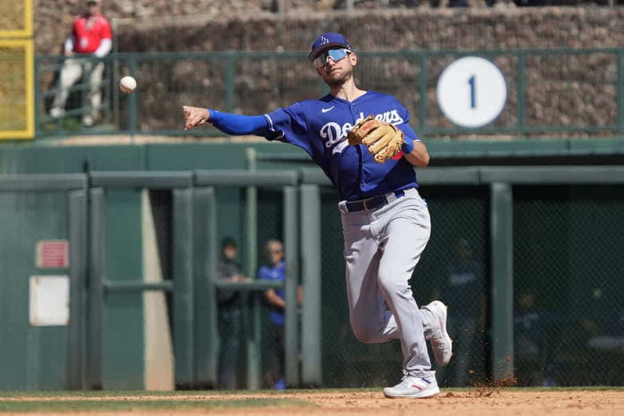 Dodgers Player Throwing Baseball Wallpaper