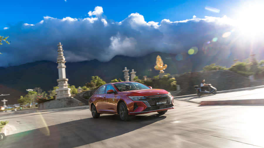 Dongfeng Luxury Sedan Cruising On A Highway Wallpaper