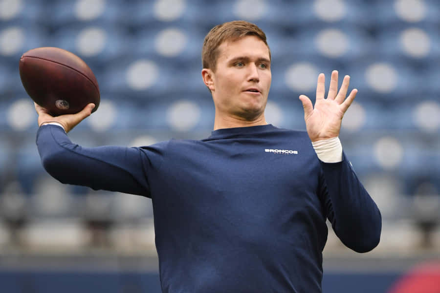Drew Lock Warming Up Before Game Wallpaper
